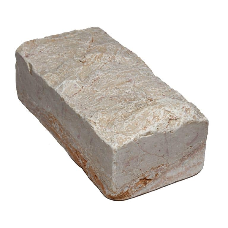 Oblique image for Portugese Alpine Limestone - Cobblestone - Splitface &amp; Tumbled. The surface finish shown is . Dominant colors shown are beige, pink and tan. The color mix creates a warm feeling.