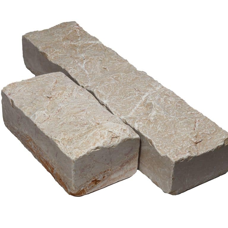 Feature image for Portugese Alpine Limestone - Cobblestone - Splitface &amp; Tumbled. The surface finish shown is . Dominant colors shown are beige, pink and tan. The color mix creates a warm feeling.