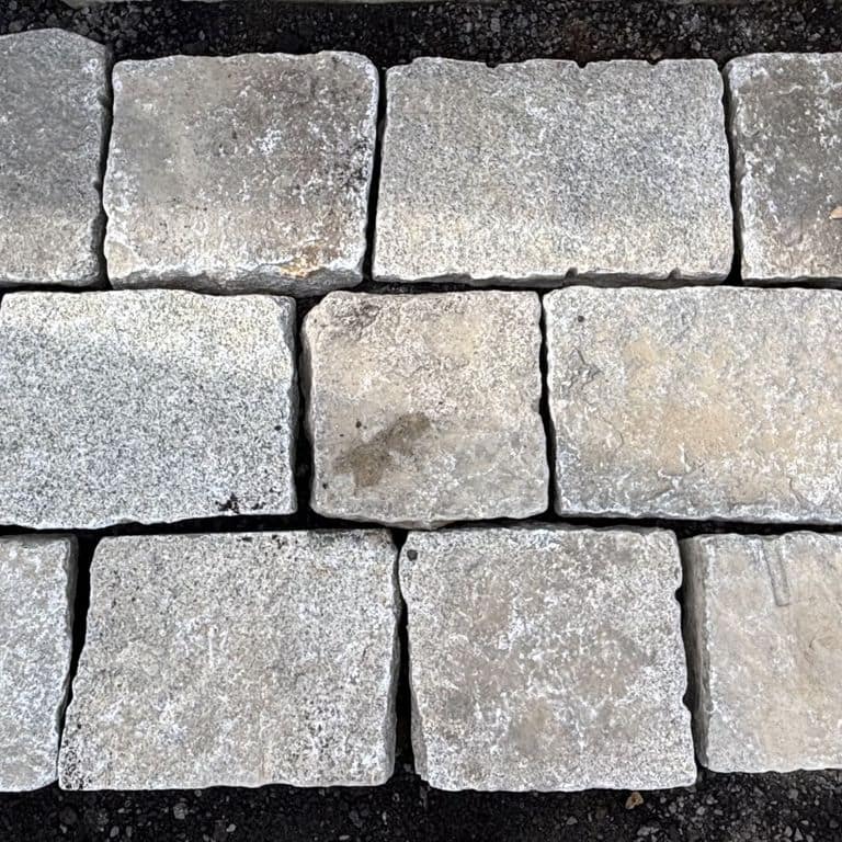 Application image for Reclaimed New England Granite - Bridge Squares. The surface finish shown is . The dominant color shown is gray. The color mix creates a cool feeling.