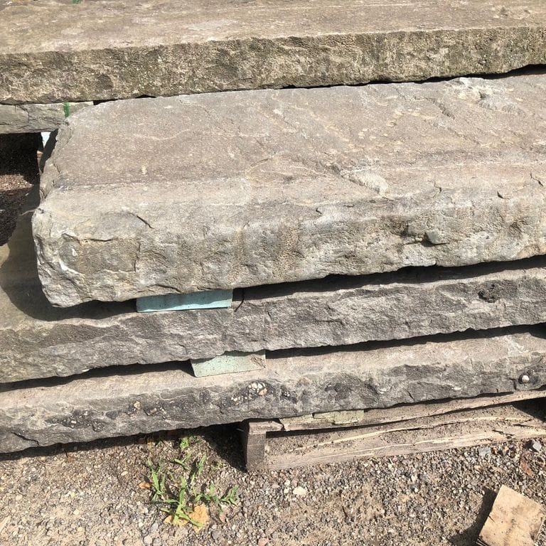 Application image for Reclaimed Bluestone Curbstone - Edging. The surface finish shown is . Dominant colors shown are beige and gray. The color mix creates a warm feeling.