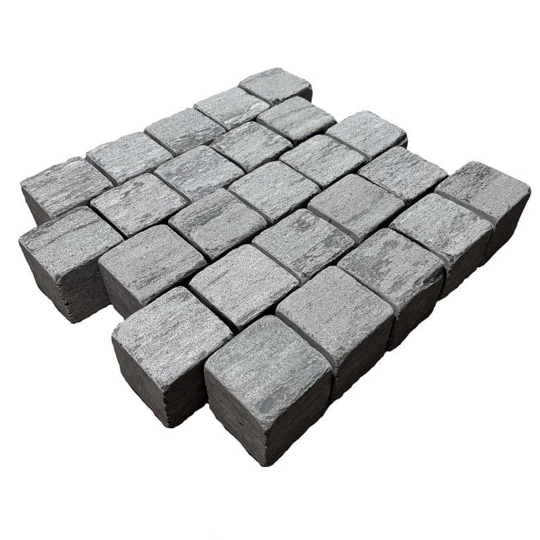 Feature image for Black Schist Cobblestone - Square - Bush Hammered &amp; Tumbled. The surface finish shown is . The dominant color shown is gray. The color mix creates a cool feeling.