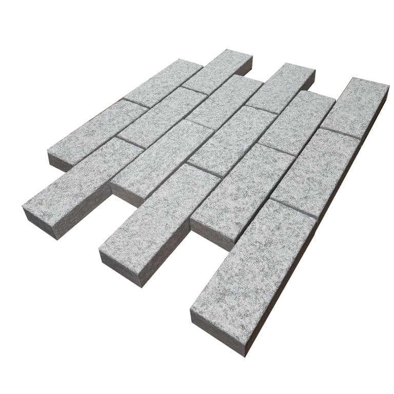 Application image for Pietra Italia Gray Gneiss - Cobblestone. The surface finish shown is sand blasted. Dominant colors shown are gray and white. The color mix creates a cool feeling.