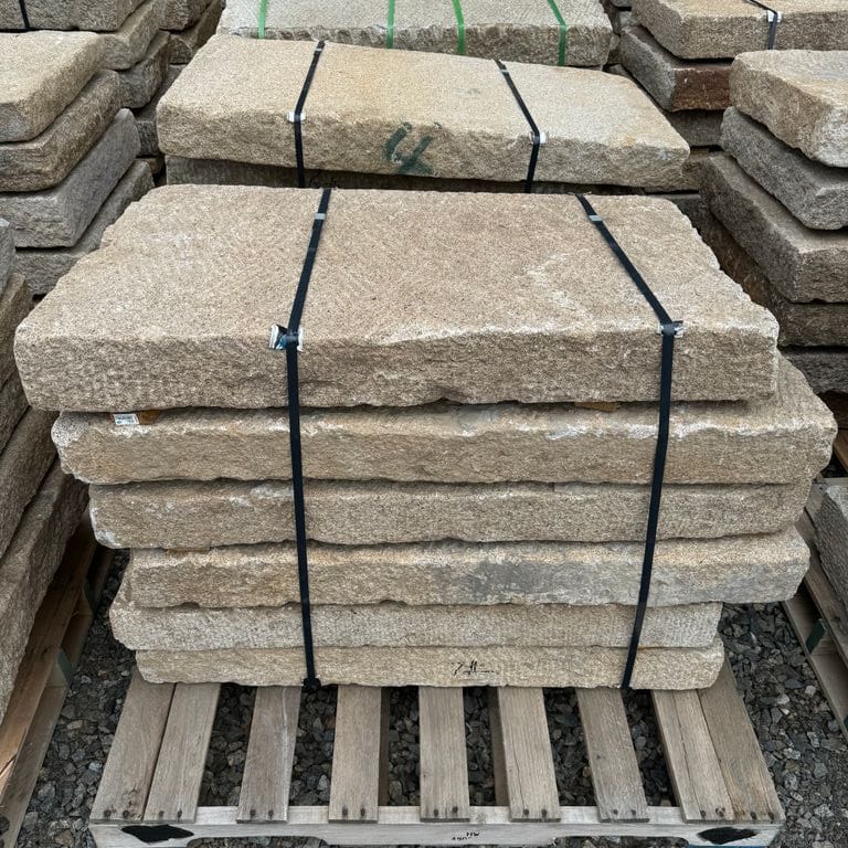 Application image for Reclaimed Rustic Golden Granite Planks 4x2' Planks. The surface finish shown is split-face. Dominant colors shown are gray and tan. The color mix creates a warm feeling.