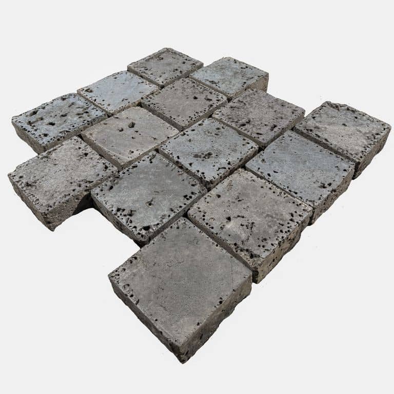 Feature image for lava cobble flat side. The surface finish shown is sawn. The dominant color shown is gray. The color mix creates a cool feeling.