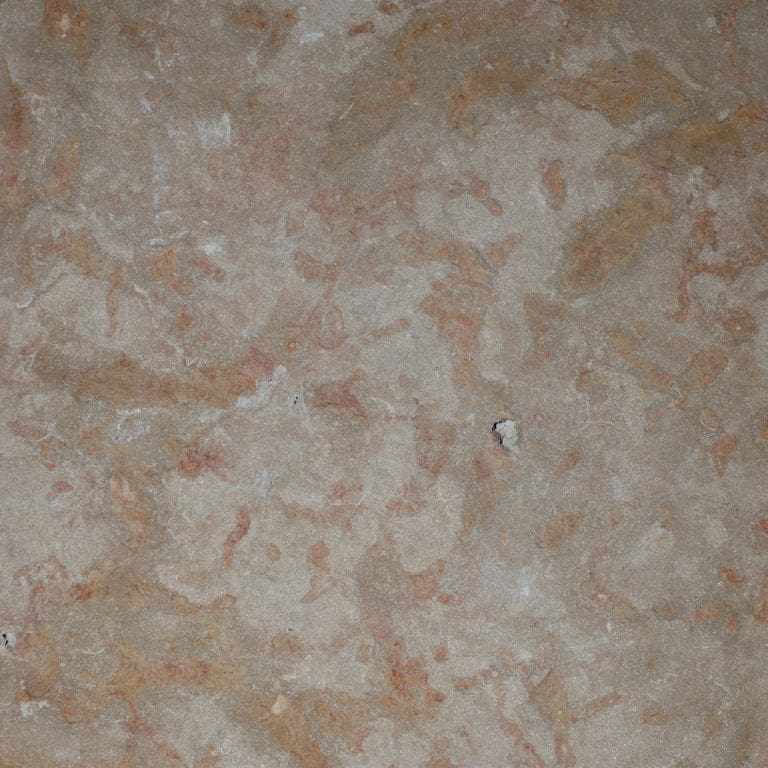 Color/Finish variation image for Madison Full Color Limestone - Pavers. The surface finish shown is flamed. Dominant colors shown are gray, pink and tan. The color mix creates a warm feeling.