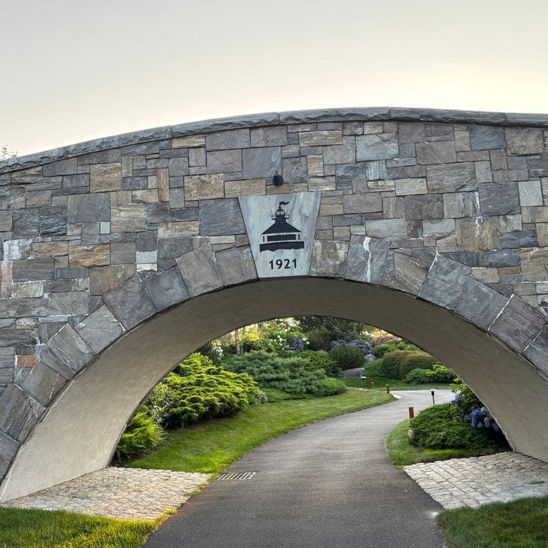 Application image for Mystic Mountain Granite - Natural Surface Veneer. The image shows this product being used for full bed veneer and thin veneer. The surface finish shown is natural. The dominant color shown is gray. The color mix creates a warm feeling.