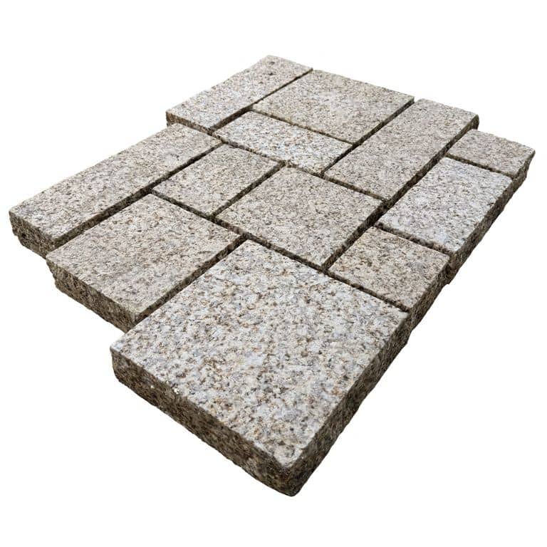 Feature image for Yellow Corn Granite - Cobblestone. The surface finish shown is sand blasted. Dominant colors shown are gray, yellow and cream. The color mix creates a warm feeling.
