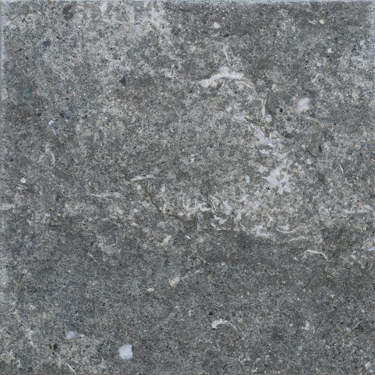 Swatch image for Titanium Gray Limestone - Pavers. The surface finish shown is flamed. The dominant color shown is gray. The color mix creates a cool feeling.