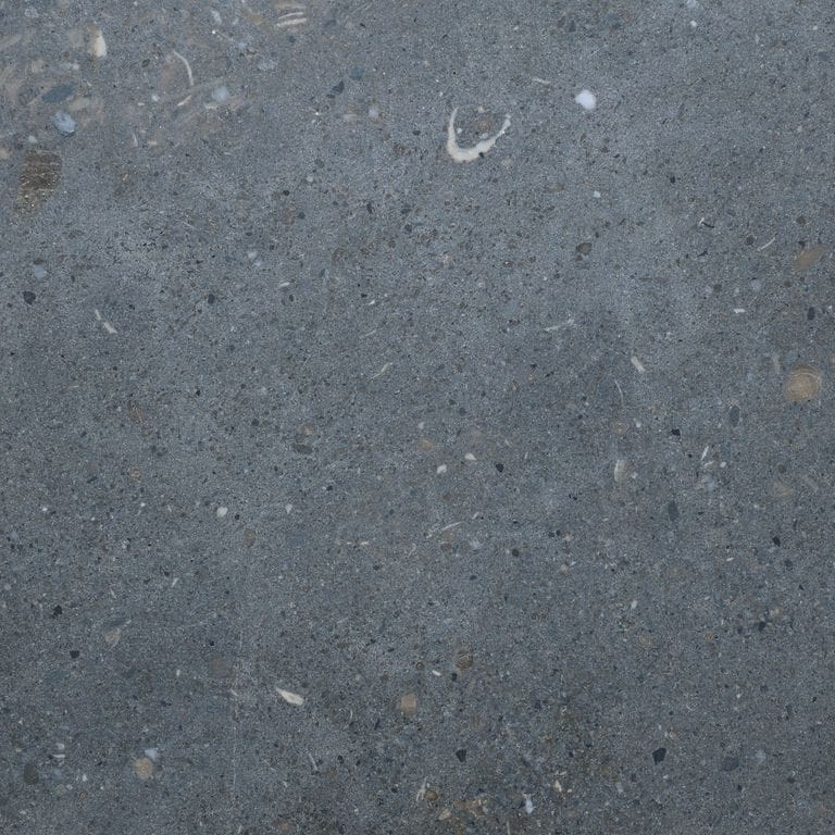 Color/Finish variation image for Titanium Gray Limestone - Pavers. The surface finish shown is honed. Dominant colors shown are blue and gray. The color mix creates a cool feeling.