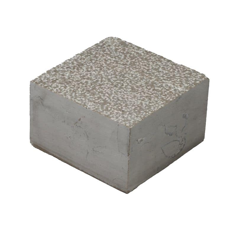 Oblique image for Amaza Estrema Limestone Cobblestone - Square - Bush Hammered. The surface finish shown is bush hammered. The dominant color shown is gray. The color mix creates a cool feeling.