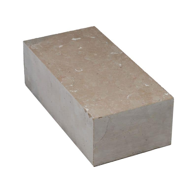 Color/Finish variation image for Amaza Estrema Limestone Cobblestone - Rectangle - Flamed. The surface finish shown is flamed. Dominant colors shown are beige and gray. The color mix creates a warm feeling.