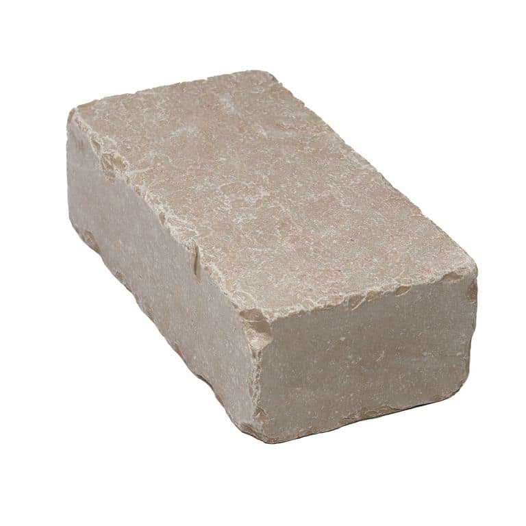 Oblique image for Amaza Estrema Limestone Cobblestone - Rectangle - Flamed &amp; Brushed. The surface finish shown is . The dominant color shown is beige. The color mix creates a warm feeling.