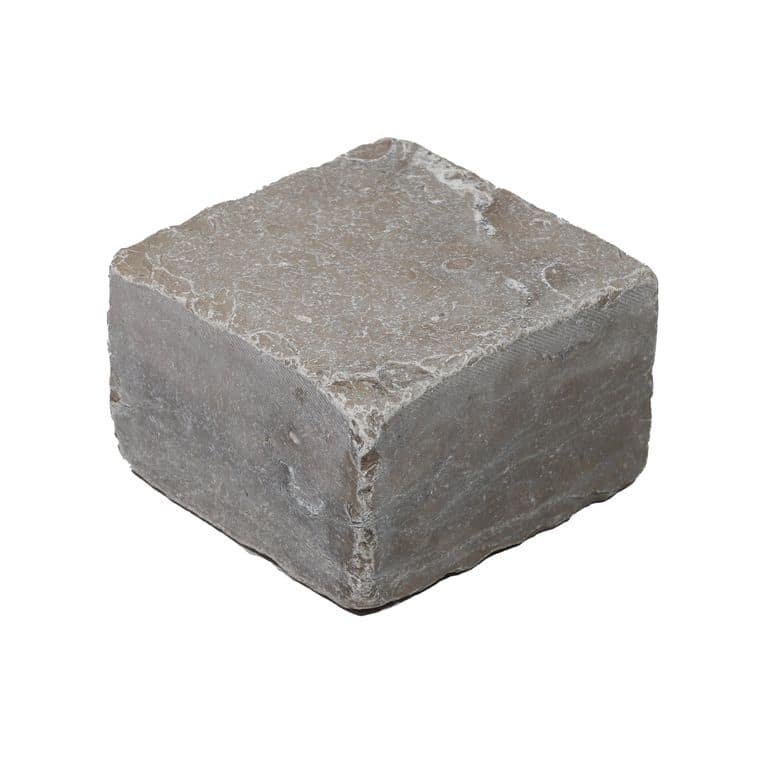 Oblique image for Amaza Estrema Limestone Cobblestone - Square - Flamed &amp; Tumbled. The surface finish shown is . The dominant color shown is gray. The color mix creates a warm feeling.