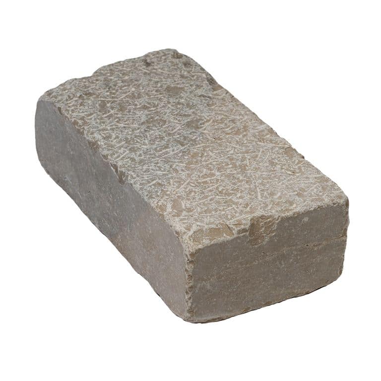 Oblique image for Amaza Estrema Limestone Cobblestone - Rectangle - Medium Clawed &amp; Tumbled. The surface finish shown is carved. Dominant colors shown are beige and gray. The color mix creates a warm feeling.