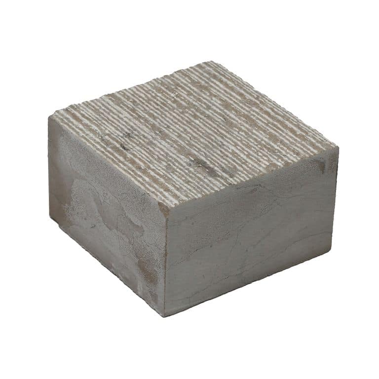 Oblique image for Amaza Estrema Limestone Cobblestone - Square - Fine Scratched. The surface finish shown is . The dominant color shown is gray.