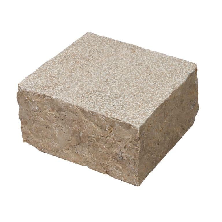 Oblique image for Mountain Hard Beige Limestone - Bush Hammered Cobblestone. The surface finish shown is bush hammered. Dominant colors shown are beige and tan. The color mix creates a warm feeling.