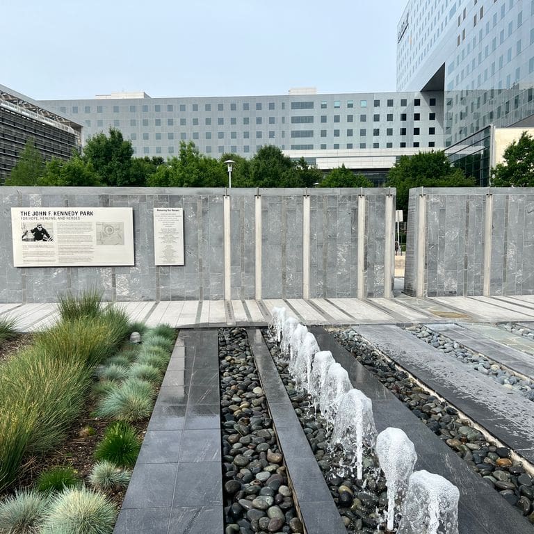 Application image for Strata Mist Cross-Cut Gneiss - Cut to Size Veneer. The image shows this product being used for water features, full bed veneer and thin veneer. The dominant color shown is gray. The color mix creates a cool feeling.