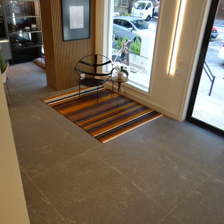 Application image for Strata Mist Cross-Cut Gneiss - Interior Flooring. The image shows this product being used in an interior floor application. The dominant color shown is gray. The color mix creates a cool feeling.