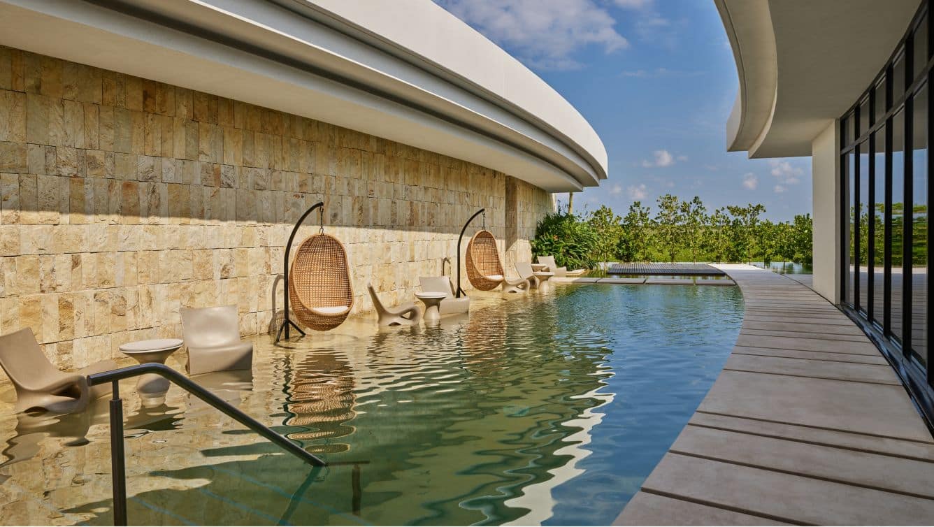 Application image for Golden Strata Gneiss - Cut to Size Veneer. The image shows this product being used in a full bed veneer application. The surface finish shown is split-face. Dominant colors shown are yellow and tan. The color mix creates a warm feeling.