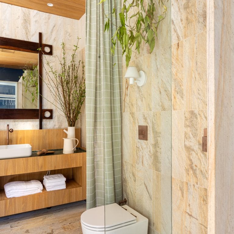 Application image for Golden Strata Gneiss - Cut to Size Veneer. The image shows this product being used in an interior cladding application. Dominant colors shown are yellow and tan. The color mix creates a warm feeling.