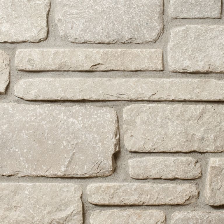 Feature image for Lannon Gray Limestone - Veneer. The image shows this product being used for full bed veneer and thin veneer. The surface finish shown is . Dominant colors shown are beige, gray and tan. The color mix creates a warm feeling.