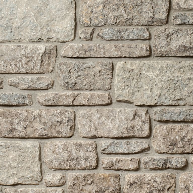 Color/Finish variation image for Madison Limestone - Veneer. The surface finish shown is . Dominant colors shown are gray and tan. The color mix creates a warm feeling.