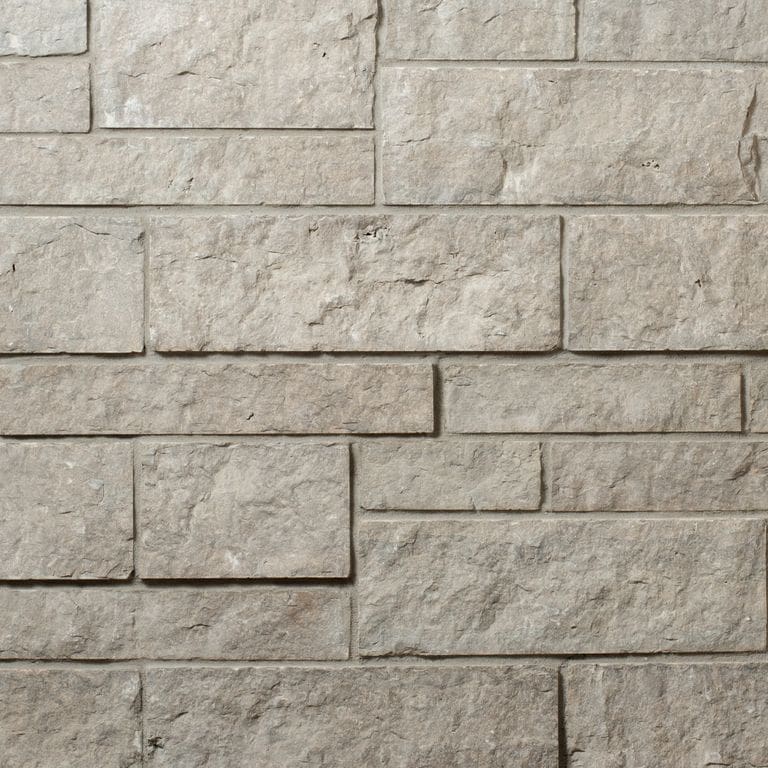 Color/Finish variation image for Madison Limestone - Veneer. The surface finish shown is split-face. The dominant color shown is gray. The color mix creates a warm feeling.