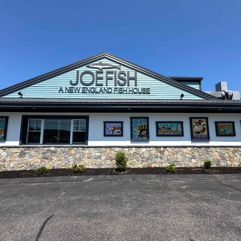 Application image for Boston Blend Granite Veneer - Mosaic. The image shows this product being used in a thin veneer application. The surface finish shown is . Dominant colors shown are gray and tan. The color mix creates a warm feeling.