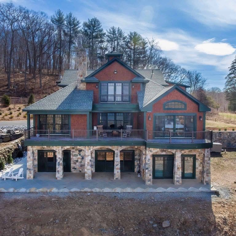 Application image for Boston Blend Granite Veneer - Mosaic. The image shows this product being used in a full bed veneer application. The surface finish shown is . The dominant color shown is gray. The color mix creates a cool feeling.