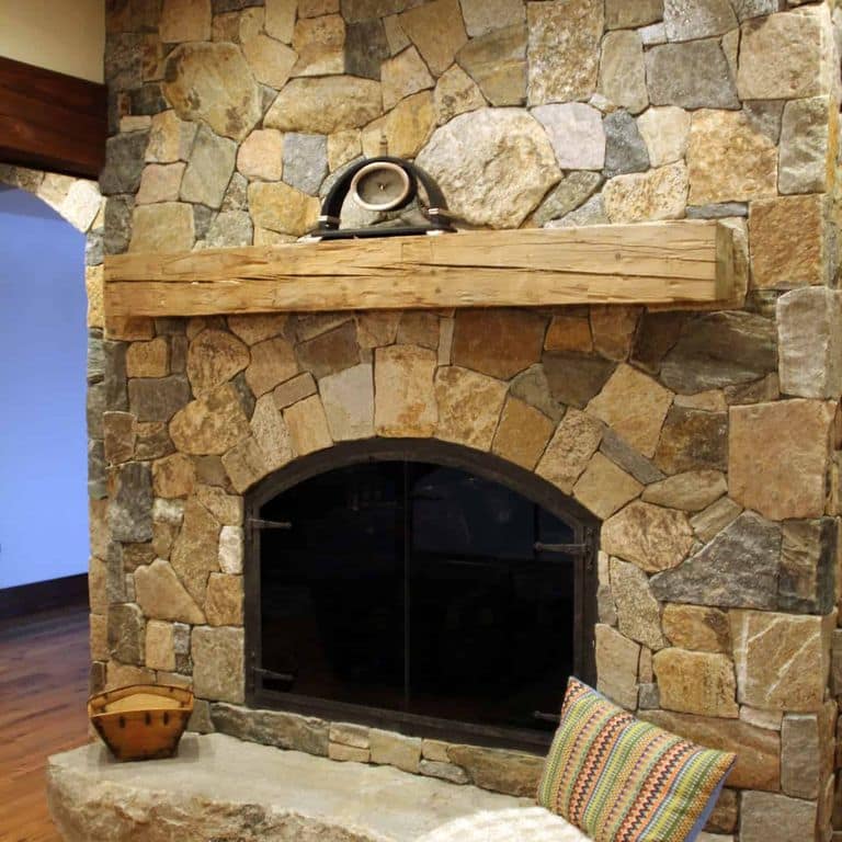 Application image for Boston Blend Granite Veneer - Mosaic. The image shows this product being used in a thin veneer application. The surface finish shown is . Dominant colors shown are brown and tan. The color mix creates a warm feeling.