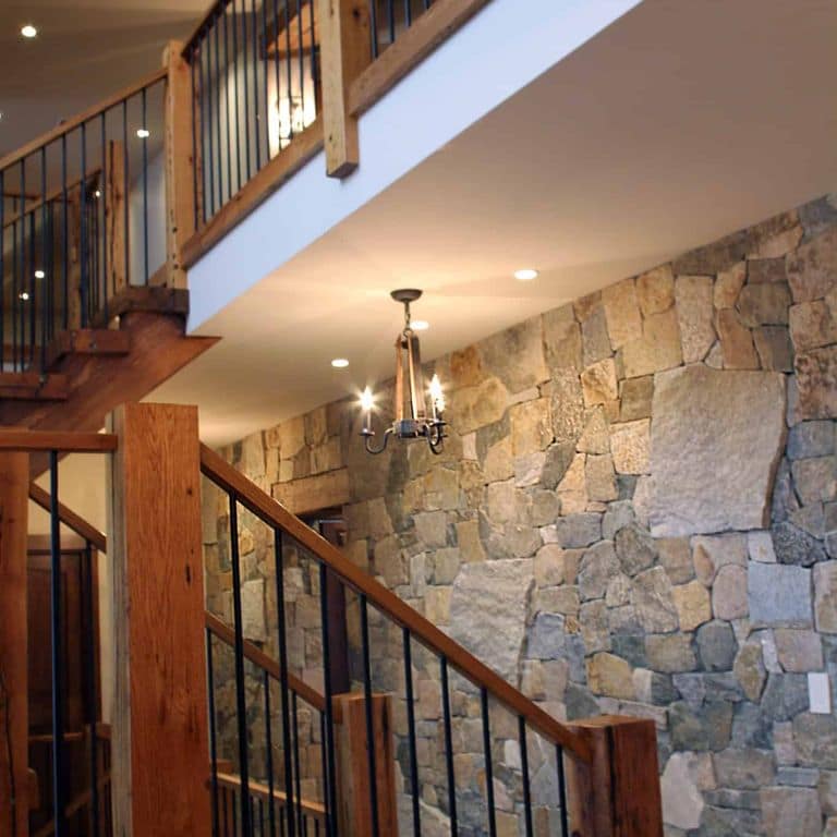 Application image for Boston Blend Granite Veneer - Mosaic. The image shows this product being used in a thin veneer application. The surface finish shown is . The dominant color shown is brown. The color mix creates a warm feeling.