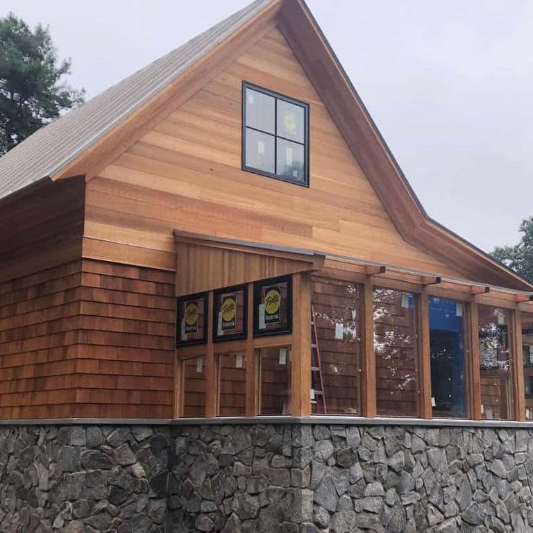 Application image for Oyster Bay Granite Thin Veneer - Mosaic. The image shows this product being used in a thin veneer application. The surface finish shown is . The dominant color shown is gray. The color mix creates a cool feeling.