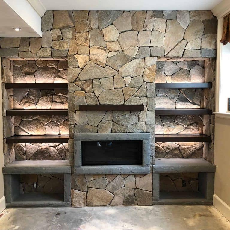 Application image for Newport Mist Granite Veneer - Mosaic. The image shows this product being used in a full bed veneer application. The surface finish shown is . Dominant colors shown are brown and tan. The color mix creates a warm feeling.