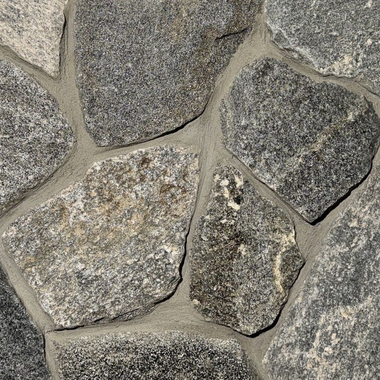Color/Finish variation image for Mystic Harbor Granite - Thin Veneer. The surface finish shown is . The dominant color shown is gray. The color mix creates a warm feeling.