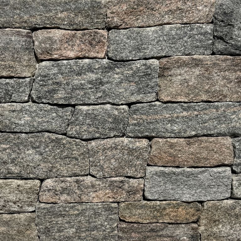 Color/Finish variation image for Vineyard Granite - Thin Veneer. The surface finish shown is split-face. The dominant color shown is gray. The color mix creates a warm feeling.