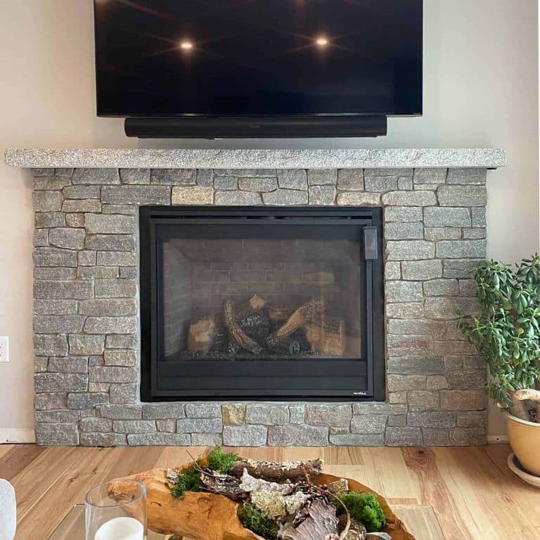 Application image for Vineyard Granite Veneer - Ledge. The image shows this product being used in a thin veneer application. The surface finish shown is split-face. The dominant color shown is gray. The color mix creates a warm feeling.