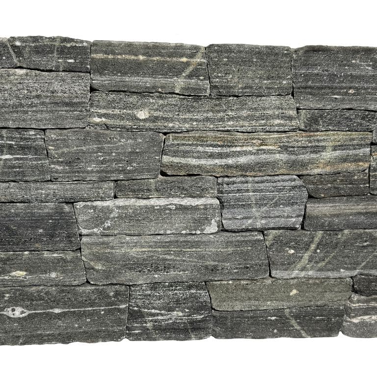 Application image for Greenwich Gray Granite Veneer - Ledge. The surface finish shown is split-face. Dominant colors shown are green and gray. The color mix creates a cool feeling.