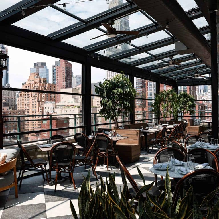 Application image for Newport Mist Granite Veneer - Square and Rectangle. The image shows this product being used in a full bed veneer application. The surface finish shown is . Dominant colors shown are gray and tan. The color mix creates a warm feeling.