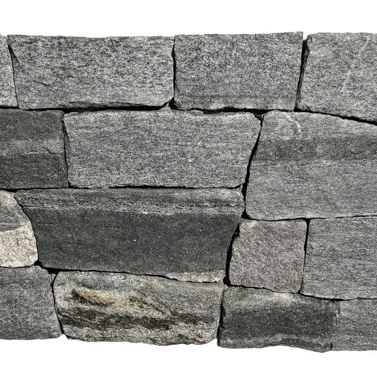 Application image for Oyster Bay Granite Thin Veneer - Ashlar. The surface finish shown is split-face. The dominant color shown is gray. The color mix creates a cool feeling.