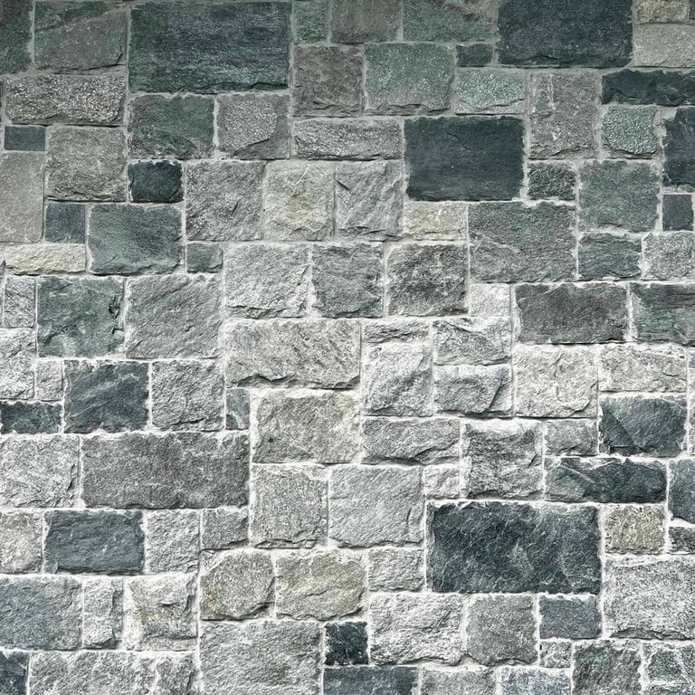 Application image for Oyster Bay Granite Thin Veneer - Square and Rectangle. The image shows this product being used in a thin veneer application. The surface finish shown is . The dominant color shown is gray. The color mix creates a cool feeling.