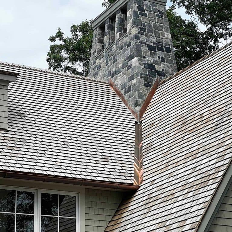 Application image for Oyster Bay Granite Thin Veneer - Square and Rectangle. The image shows this product being used in a thin veneer application. The surface finish shown is . The dominant color shown is gray. The color mix creates a cool feeling.