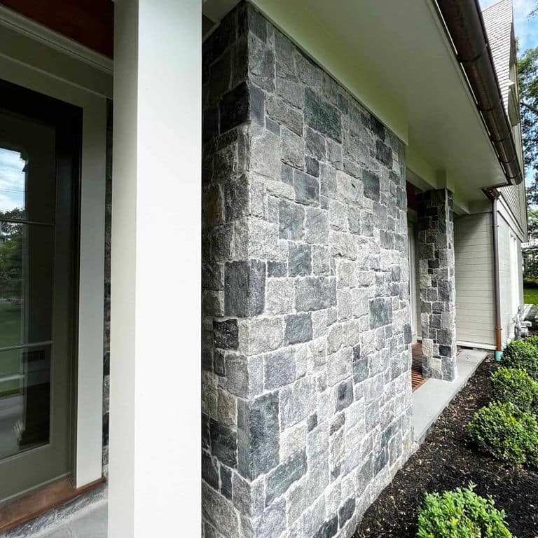 Application image for Oyster Bay Granite Thin Veneer - Square and Rectangle. The image shows this product being used in a thin veneer application. The surface finish shown is . The dominant color shown is gray. The color mix creates a cool feeling.