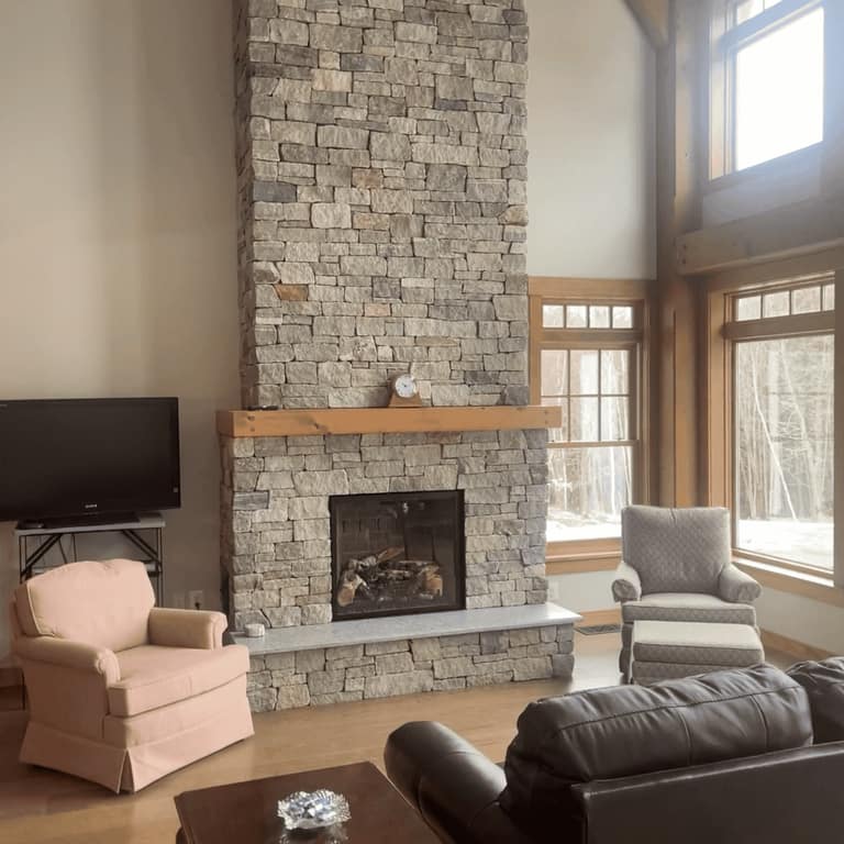 Application image for Boston Blend Granite Thin Veneer - Ashlar. The image shows this product being used in a thin veneer application. The surface finish shown is split-face. The dominant color shown is gray. The color mix creates a warm feeling.