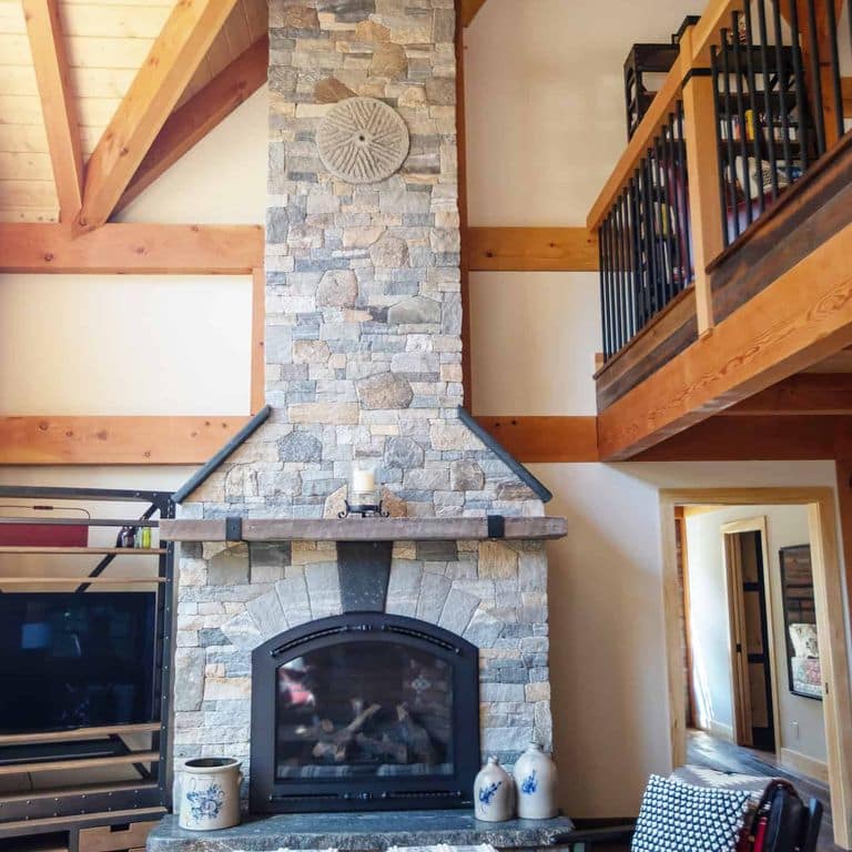 Application image for Boston Blend Granite Thin Veneer - Ashlar. The image shows this product being used in a thin veneer application. The surface finish shown is split-face. Dominant colors shown are gray and tan. The color mix creates a warm feeling.