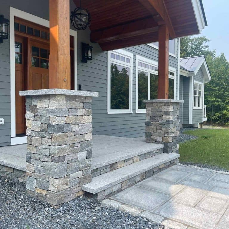 Application image for Boston Blend Granite Thin Veneer - Ashlar. The image shows this product being used in a thin veneer application. The surface finish shown is split-face. The dominant color shown is gray. The color mix creates a cool feeling.