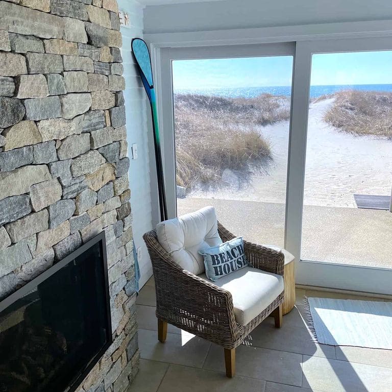 Application image for Boston Blend Granite Veneer - Ledge. The image shows this product being used in a thin veneer application. The surface finish shown is split-face. The dominant color shown is gray. The color mix creates a cool feeling.