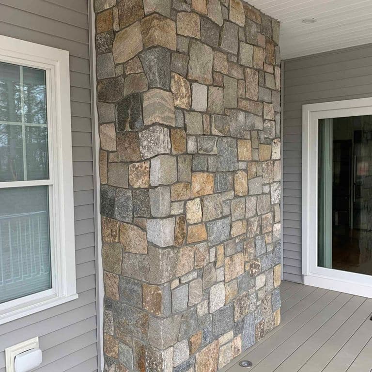 Application image for Boston Blend Granite Veneer - Square and Rectangles. The image shows this product being used in a thin veneer application. The surface finish shown is . The dominant color shown is gray. The color mix creates a warm feeling.
