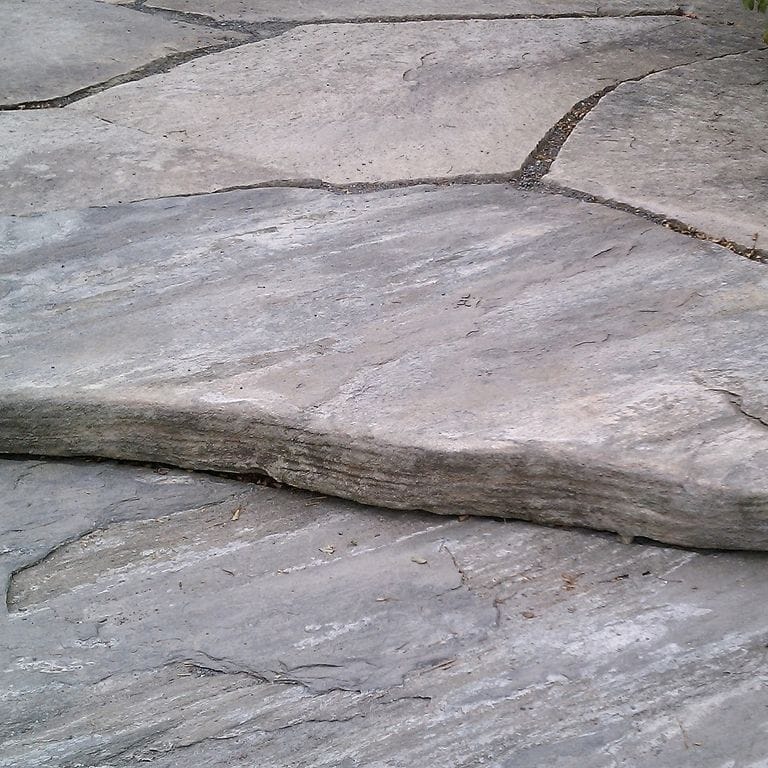 The image shows this product being used for Granite- Mystic Mountain- Natural - Oversized Pavers.