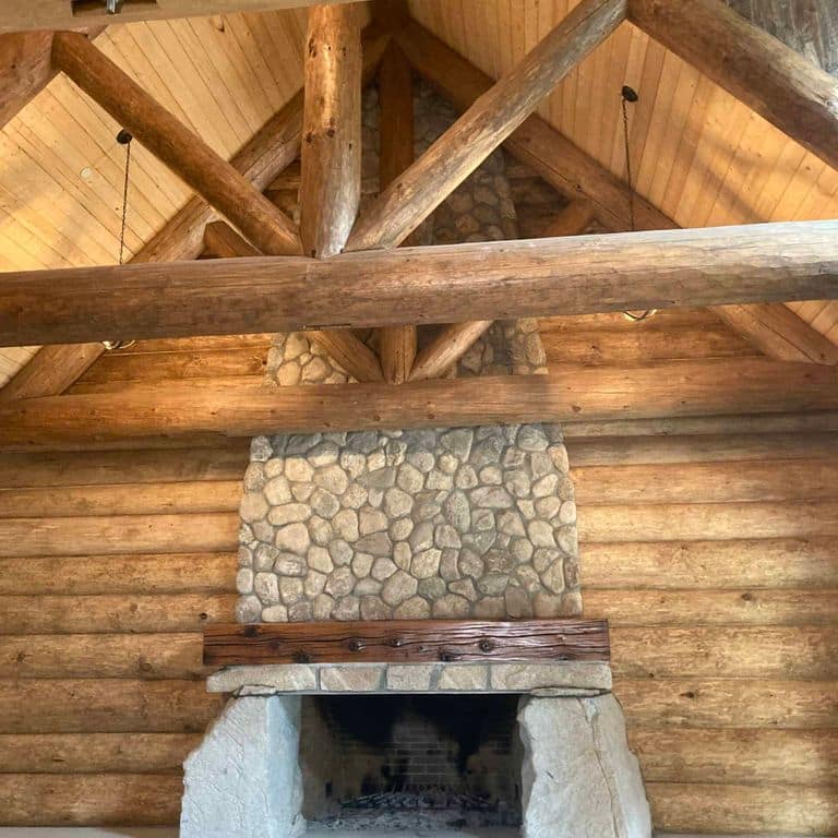 Application image for Boston Blend Granite Veneer - Rounds. The image shows this product being used in a full bed veneer application. The surface finish shown is . The dominant color shown is brown. The color mix creates a warm feeling.