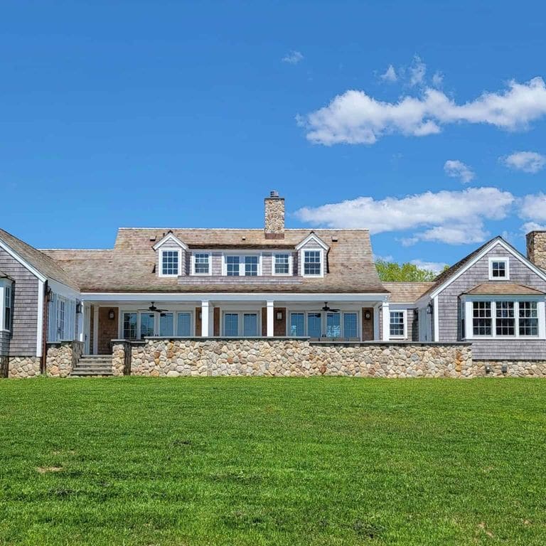 Application image for Boston Blend Granite Veneer - Rounds. The image shows this product being used in a thin veneer application. The surface finish shown is . Dominant colors shown are beige and tan.